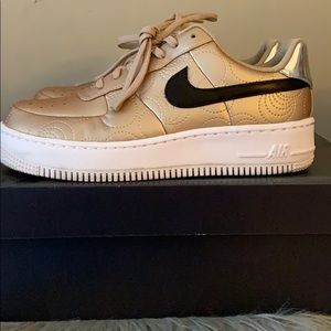 Nike Air Force women’s 8.5 gold